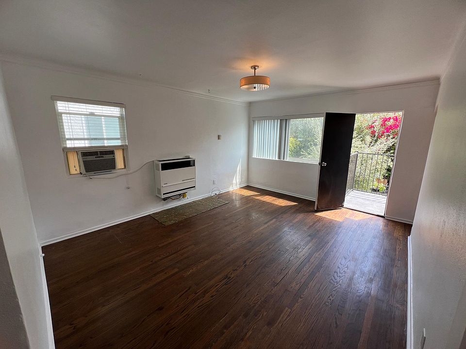 Living Room - Balcony Door Open (Window A/C Unit included)