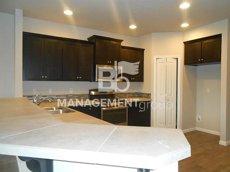 7084 NW Abigail Ter — Photo 8