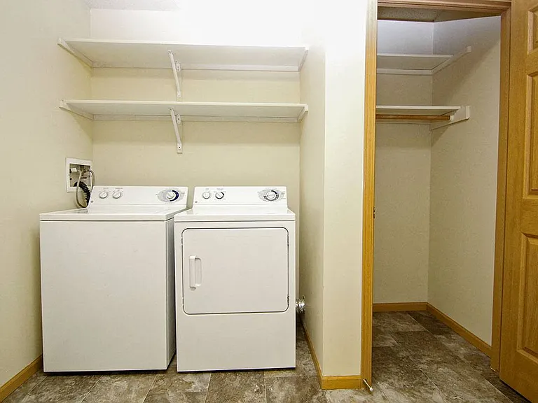 The Gulf floor plan offers a spacious laundry room with storage.