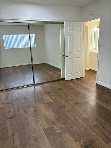 Primary Bedroom #2 also Featuring Mirrored Closet Doors