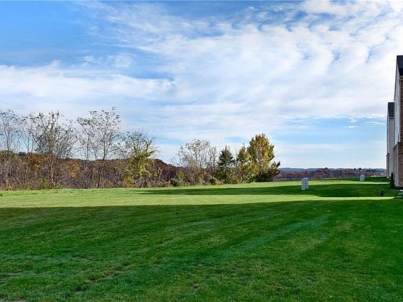 This fabulous side yard is the property of this unit!   Beautiful and private!