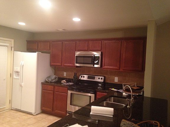 Larger view of the kitchen