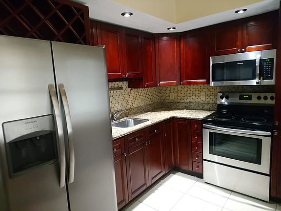 3rd image of 2751 N Palm Aire Dr APT 203