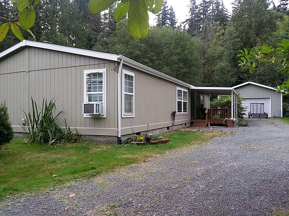 HOUSE WITH DETACHED GARAGE BEHIND