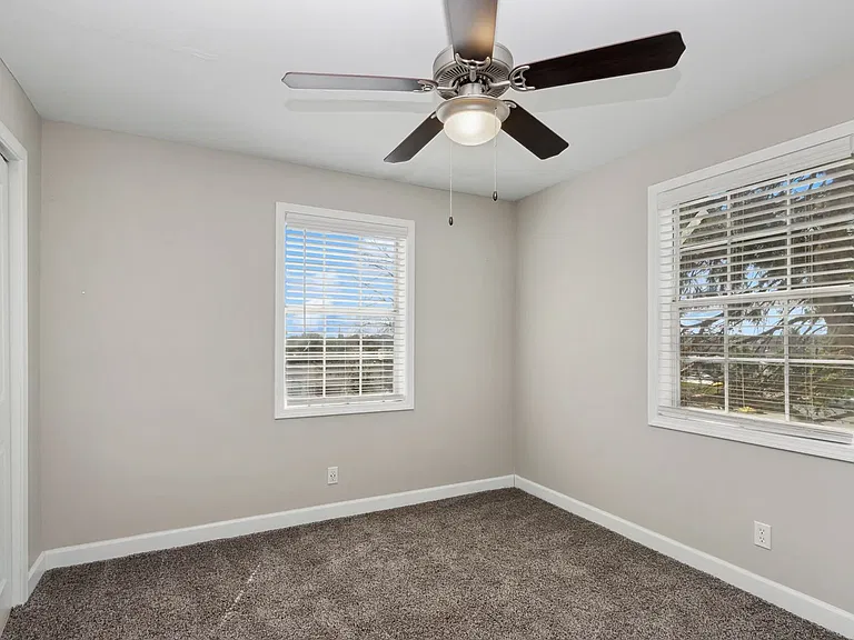 Carpeted Bedroom w/ Ceiling Fan