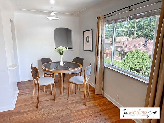 Dining area with a nook, great for decorating or extra storage!