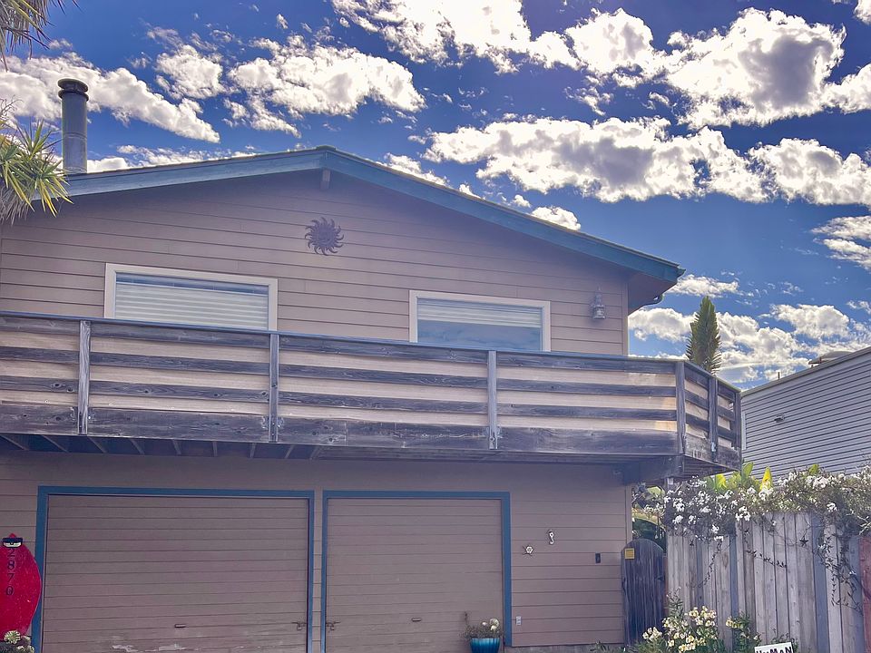Entrance is through side gate or garage. There is no "front door"