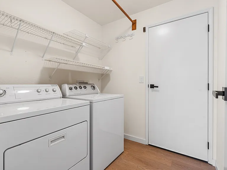 Good-sized laundry/mud room offering plenty of space and functionality.