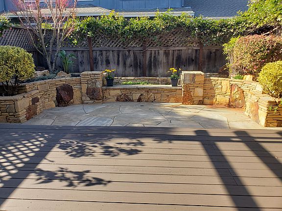 Personal deck and patio perfect for relaxing on a sunny day