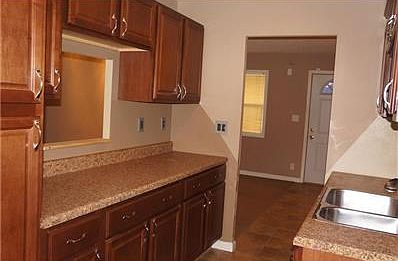 Enjoy your spacious counter tops and ample cabinets...