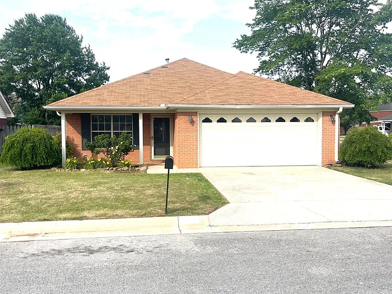 Front of house with two car garage