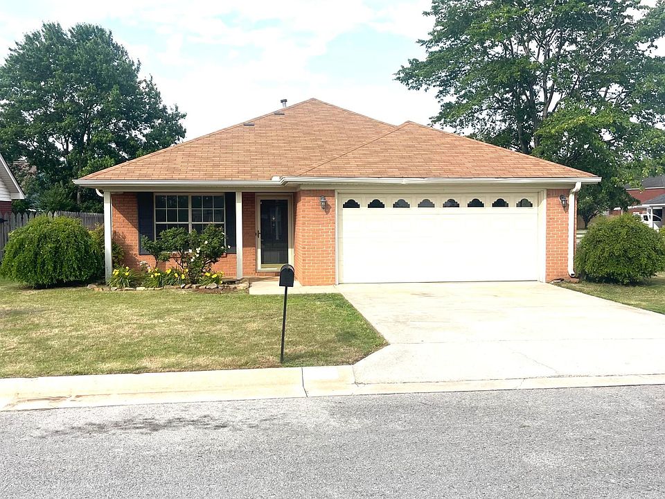 Front of house with two car garage