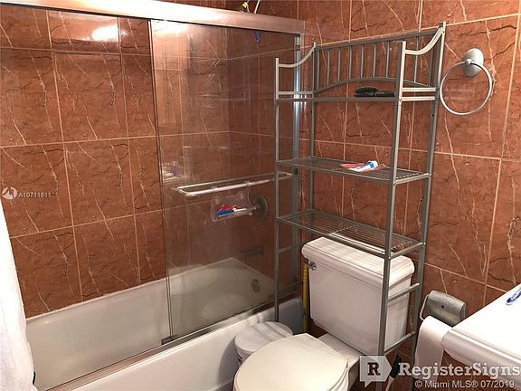 5th image of 200 177th Dr APT 407