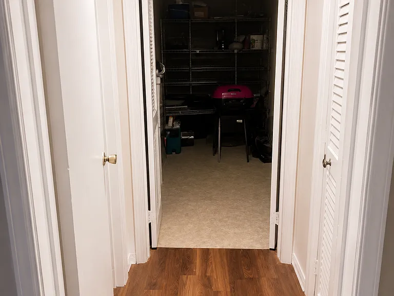Basement hallway to Bathroom and Utility room