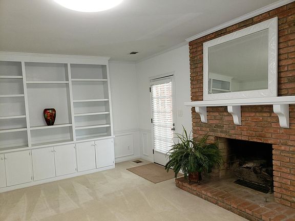 Large livingroom with built in shelves