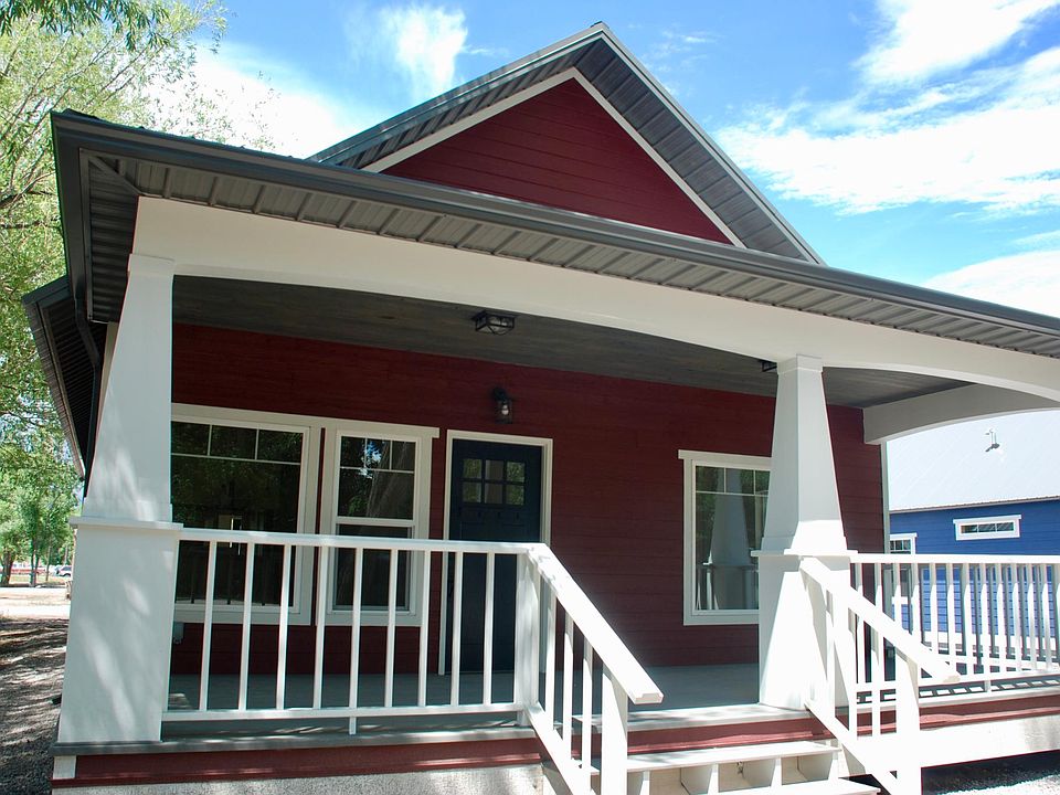 Craftsman style bungalow with covered front porch.