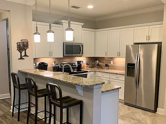 5th image of 8955 Tuscany Isles Dr