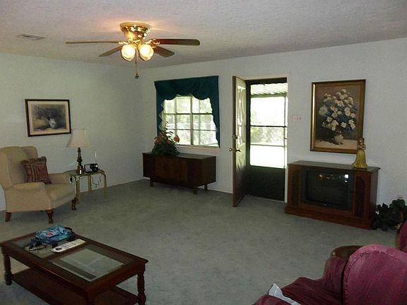 Another view of the den, this time from the kitchen area towards the back door