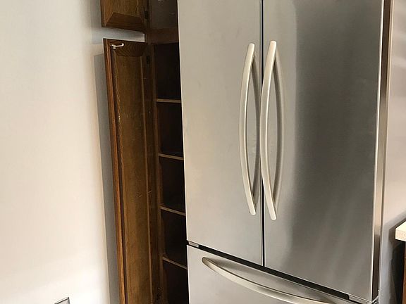 Refrigerator and cabinets