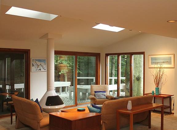 Family Room with doors & windows by Anderson