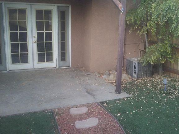 Back doors to private patio area and garage
