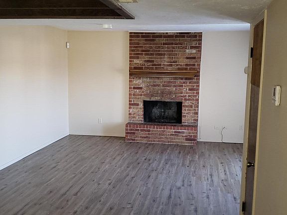 Living Room w/wood burning fireplace