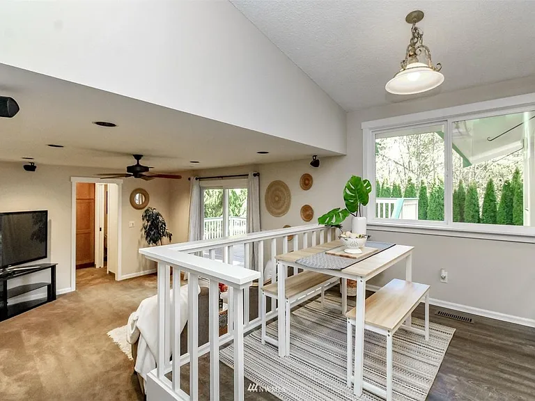 Step down to second living room also with Deck access