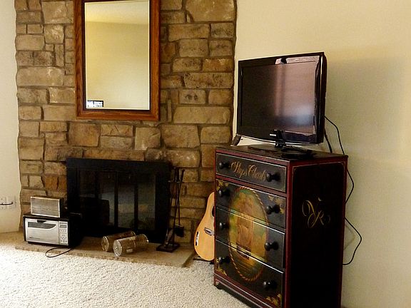 Rock wall fireplace
