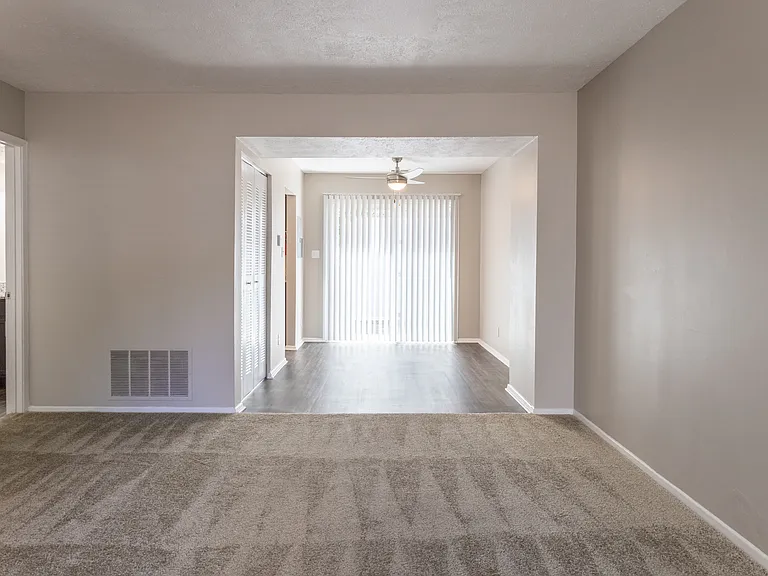 Dining and Living Room in the Two Bedroom Townhome at Woodbridge Bloomington