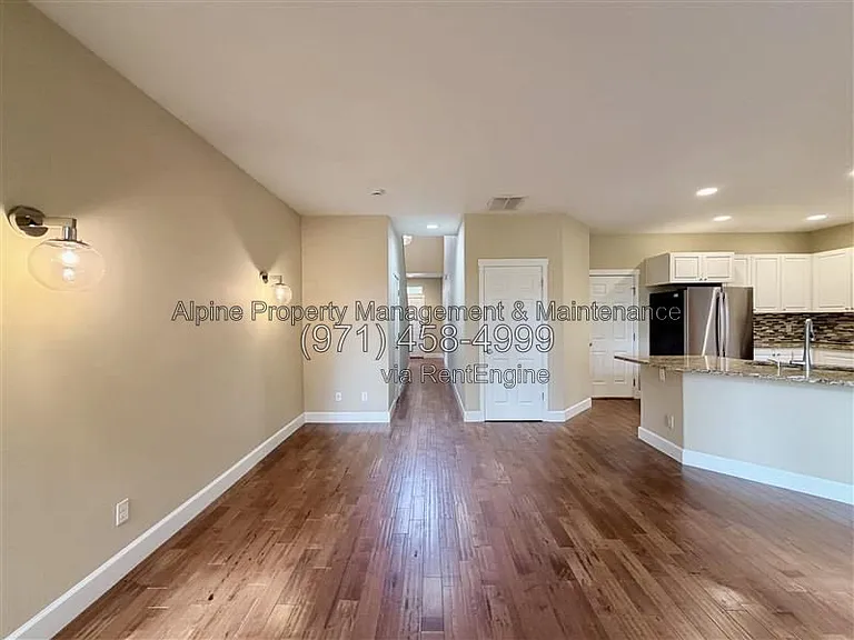 5758 NE Damsel Dr — Photo 5