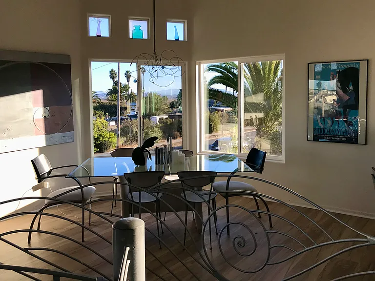 Dining area with view of neighborhood.