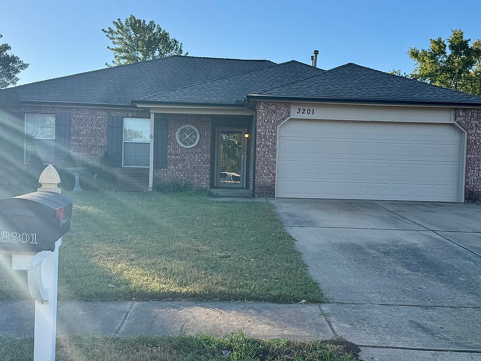 Fresh Exterior paint, new gutters, and low-maintenance landscaping.