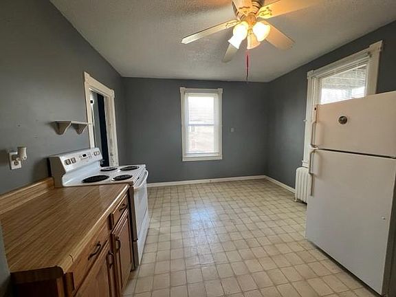 spacious eat in kitchen with room for bistro table + chairs