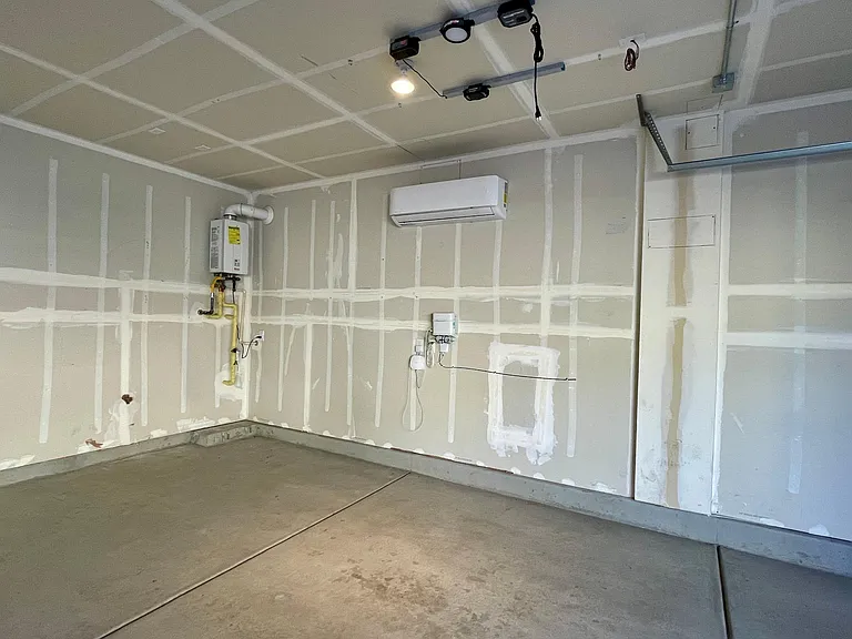 Climate-controlled 3-car garage/workshop