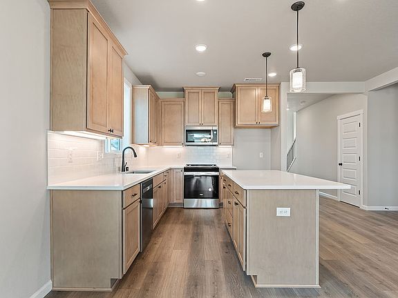 7110 S Holly ST by Aho Construction