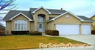 front view
						:
						large yard, 3rd garage not pictured