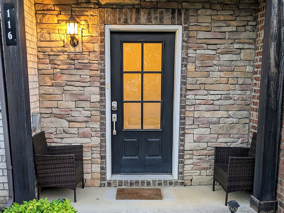 Front door with patio seating and keyless entry