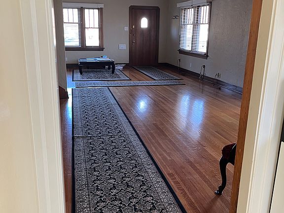 View taken from kitchen entryway to front door