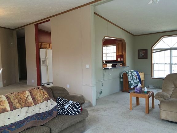 The kitchen has an open pass through to the living room.