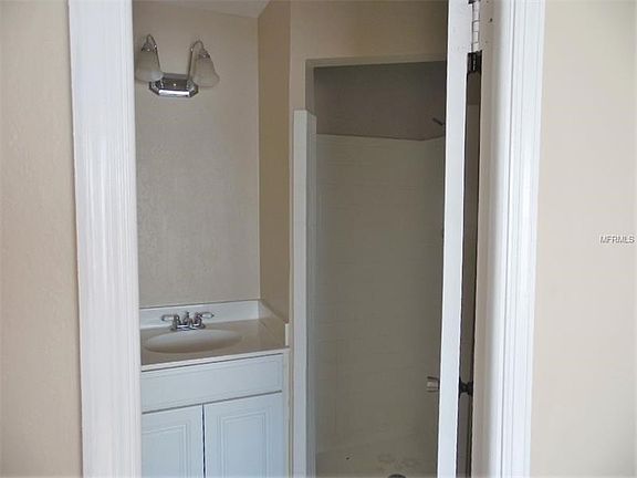 Master bath with wall in shower