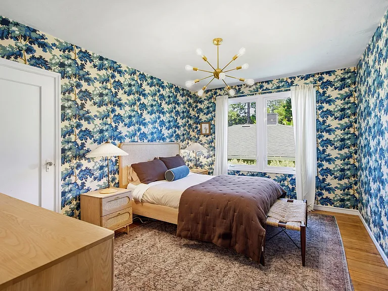 This bedroom is on the main floor and has a queen bed.