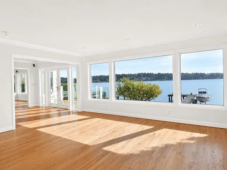 Living room opens to dining and media rooms