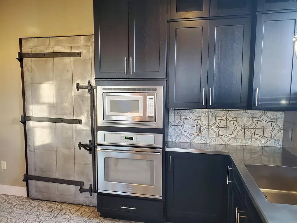 Walk-in pantry on left- Original to building door