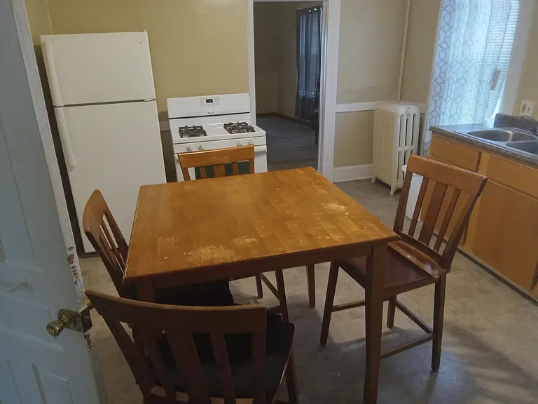 Leaving Bathroom looking at Kitchen nook