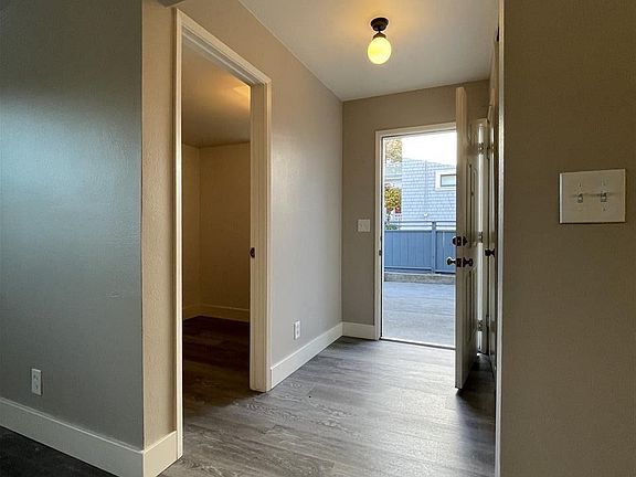 Small den to the left of the entry