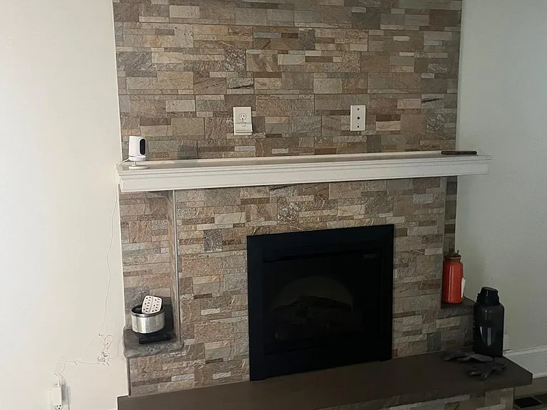 Beautiful Fireplace and Mantel in Living Room