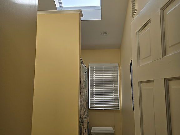 Bright full bath with skylig