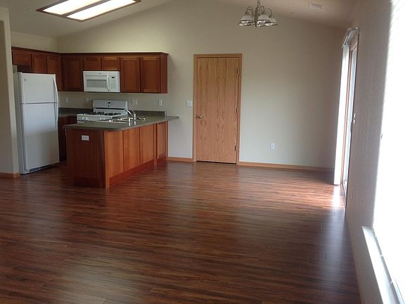 Open Living, Dining and Kitchen area with vaulted ceiling