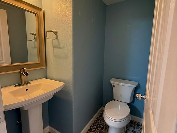 Convenient downstairs half bathroom.