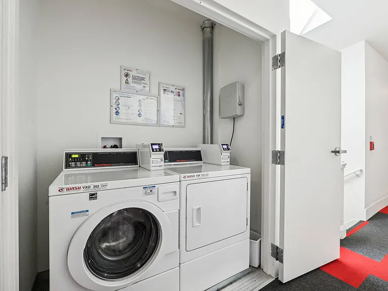 Room with a washer and dryer